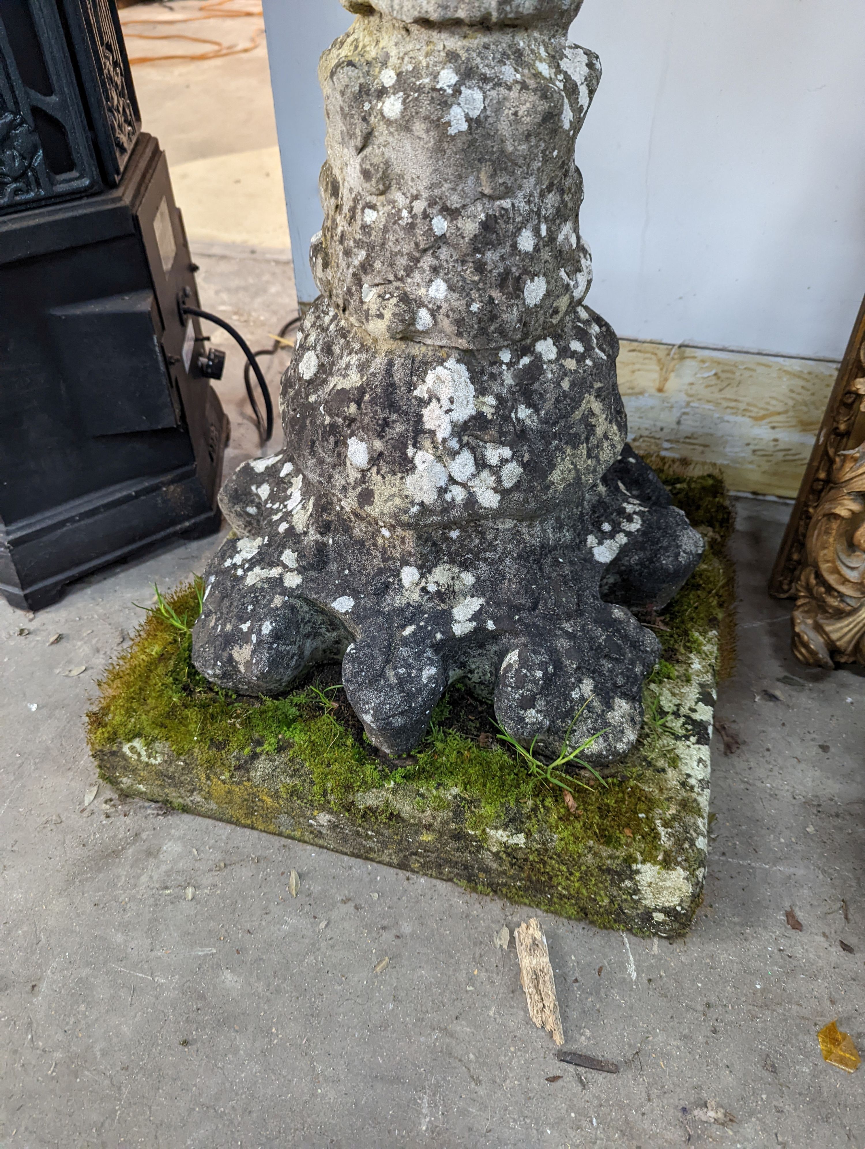 A circular reconstituted stone bird bath, diameter 56cm, height 89cm